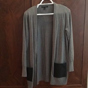 Cardigan with leather pockets